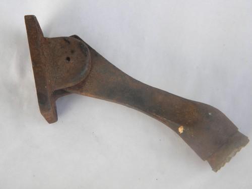 photo of vintage heavy old iron fold-up doorstop for swinging door #1