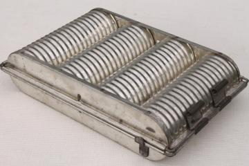 catalog photo of vintage heavy steel fluted pan baking mold for round loaf slicing bread or tea cake