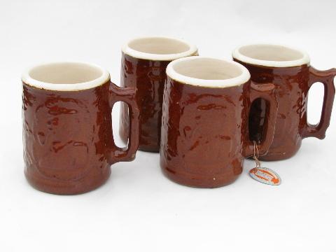 photo of vintage heavy stoneware pottery beer steins or cider mugs, man w/ pipe #1