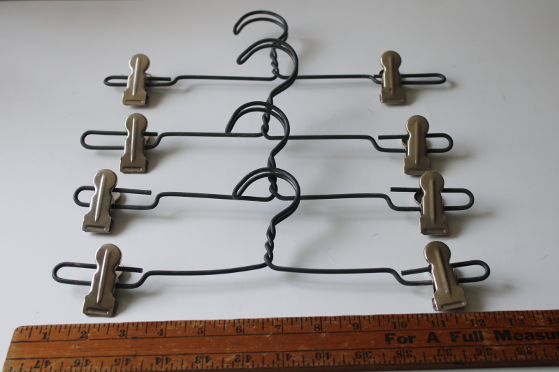 photo of vintage heavy twisted wire clothes hangers w/ study metal spring clips, skirt or fabric hangers set of four #1