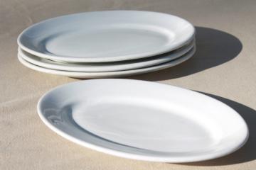 catalog photo of vintage heavy white ironstone china platters or oval lobster plates, set of four