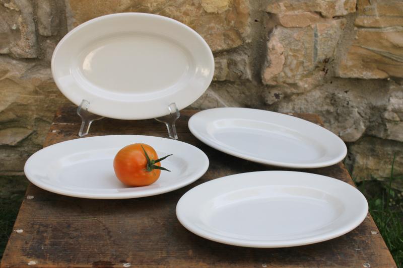 photo of vintage heavy white ironstone china platters or oval plates stack of four #1