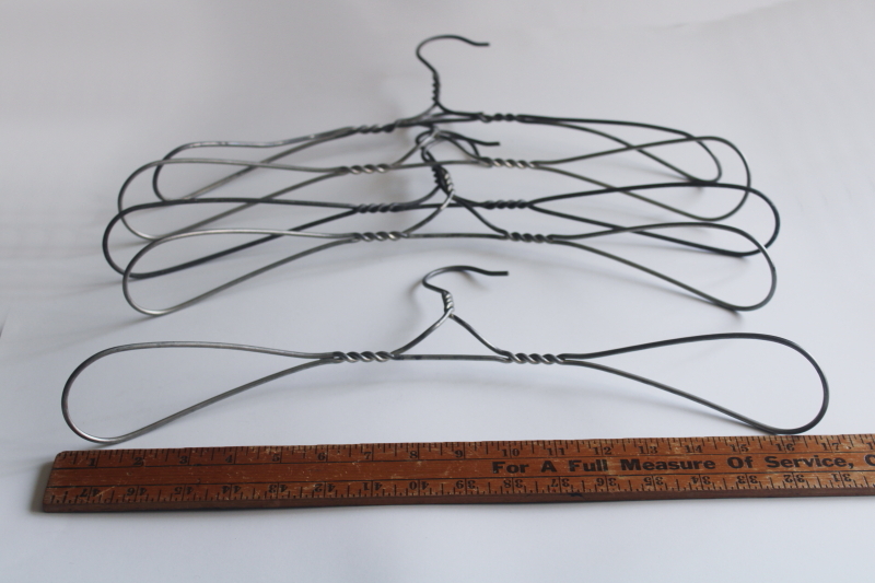 photo of vintage heavy wire clothes coat hangers, well made utilitarian industrial minimalist  #2