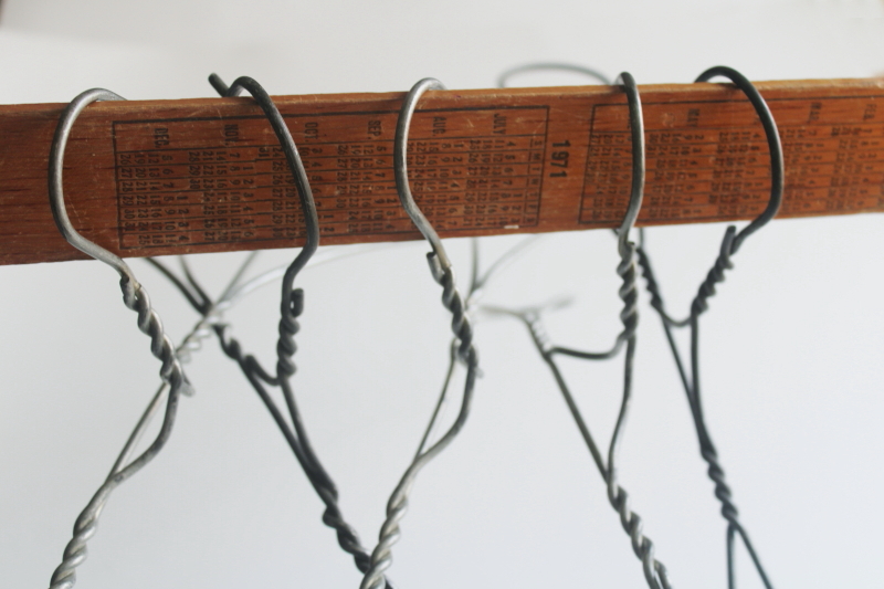 photo of vintage heavy wire clothes coat hangers, well made utilitarian industrial minimalist  #6