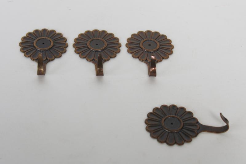 photo of vintage hooks or wall hangers, small metal flowers to mount with push pins or tacks #1