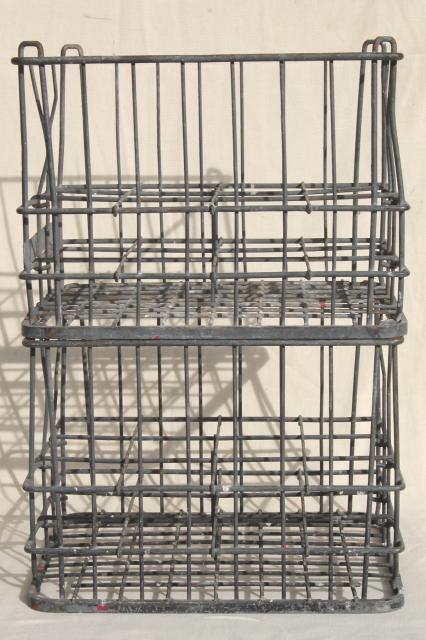 photo of vintage industrial milk crates, stacking metal boxes w/ old Mineral Point Wisconsin label #5