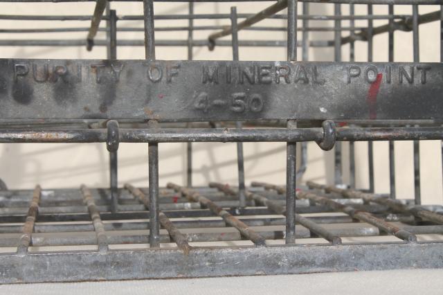 photo of vintage industrial milk crates, stacking metal boxes w/ old Mineral Point Wisconsin label #9