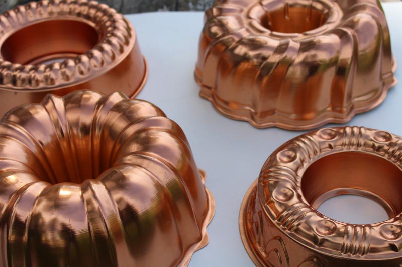 photo of vintage jello molds, ring mold collection copper aluminum pans kitchen wall hanging #1