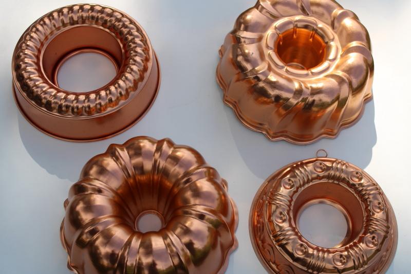 photo of vintage jello molds, ring mold collection copper aluminum pans kitchen wall hanging #3