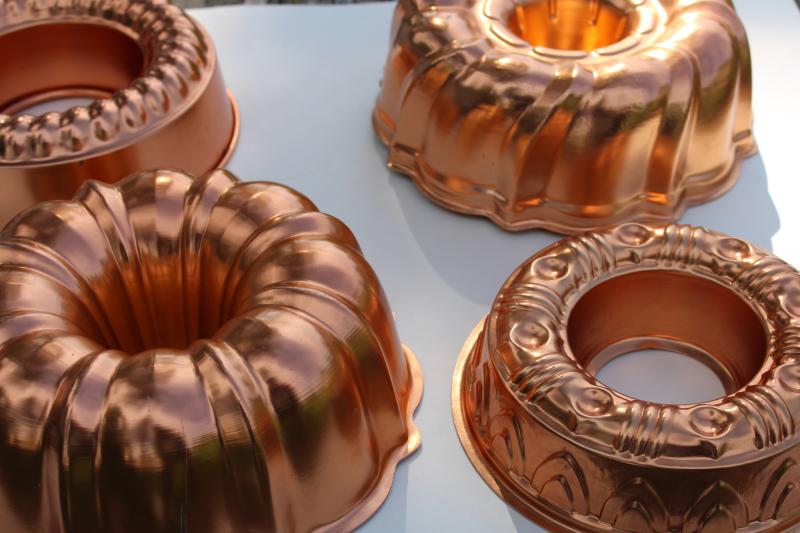 photo of vintage jello molds, ring mold collection copper aluminum pans kitchen wall hanging #4