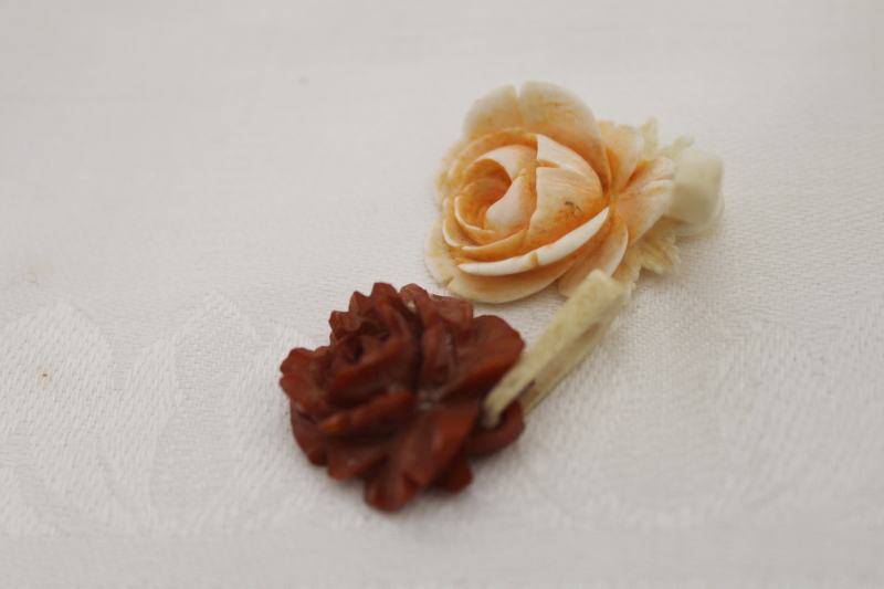 photo of vintage jewelry, carved bone rose pendants, one white, one brown #3