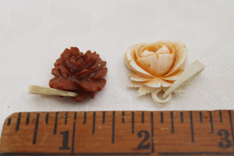 photo of vintage jewelry, carved bone rose pendants, one white, one brown #4