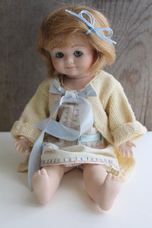 photo of vintage jointed bisque china doll marked Germany, girl doll w/ glass eyes #1