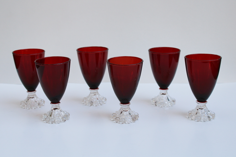 photo of vintage juice glasses, royal ruby red w/ clear foot Anchor Hocking boopie pattern #1