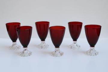 catalog photo of vintage juice glasses, royal ruby red w/ clear foot Anchor Hocking boopie pattern 