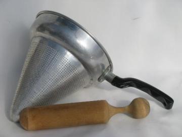 catalog photo of vintage kitchen food mill / juicer, strainer sieve cone and wood masher