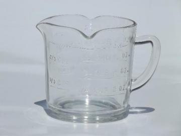 catalog photo of vintage kitchen glass measuring cup, Federal mark clear depression glass 