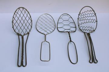 catalog photo of vintage kitchen utensils lot, four different wire spoons, skimmer strainer paddle shape whisks 