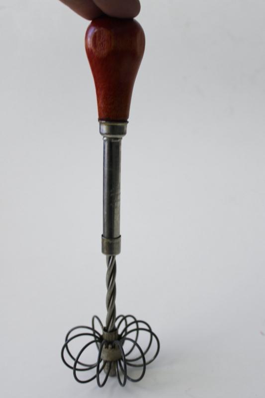 photo of vintage kitchen whisk or eggbeater, patent spring loaded push design looped wire whip #5