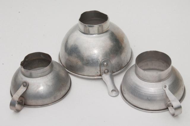 photo of vintage kitchenware lot, aluminum metal measuring cups, scoops, funnels #11