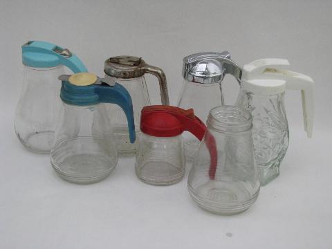 photo of vintage kitchenware lot, collection of kitchen glass syrup pitchers #1