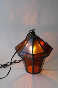 catalog photo of vintage leaded stained amber glass lantern hanging light pendant or swag lamp