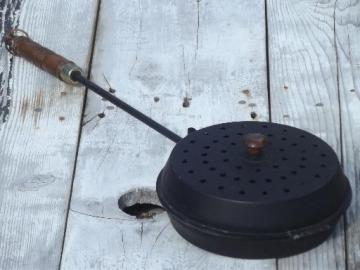 catalog photo of vintage long handled popcorn popper for campfire, fire pit or fireplace