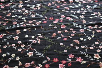 catalog photo of vintage machine embroidered rayon fabric, silky thread floral pattern on black