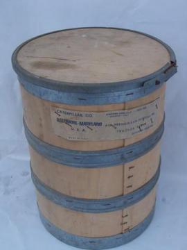 catalog photo of vintage machine-age industrial wood storage barrel or parts bin