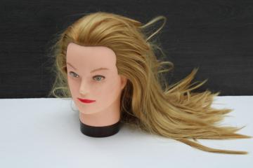 catalog photo of vintage mannequin plastic head model life size with long hair, green eyed strawberry blonde redhead