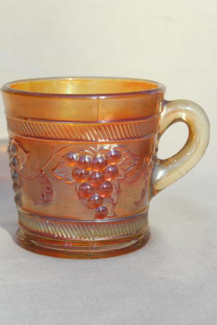 photo of vintage marigold carnival glass, Dugan grapes pattern mug or child's cup #1