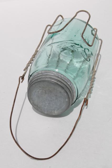 photo of vintage mason jar carrier rack, wire handle basket holds old blue glass jar #2