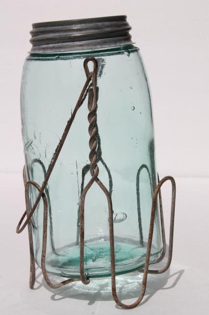 photo of vintage mason jar carrier rack, wire handle basket holds old blue glass jar #4