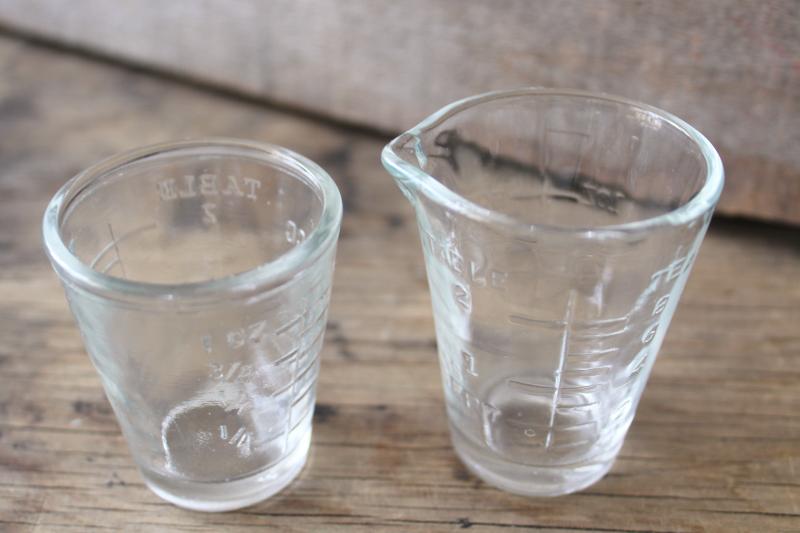 photo of vintage medicine glasses, shot glass size w/ embossed measures marked doses #3