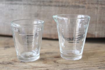 catalog photo of vintage medicine glasses, shot glass size w/ embossed measures marked doses