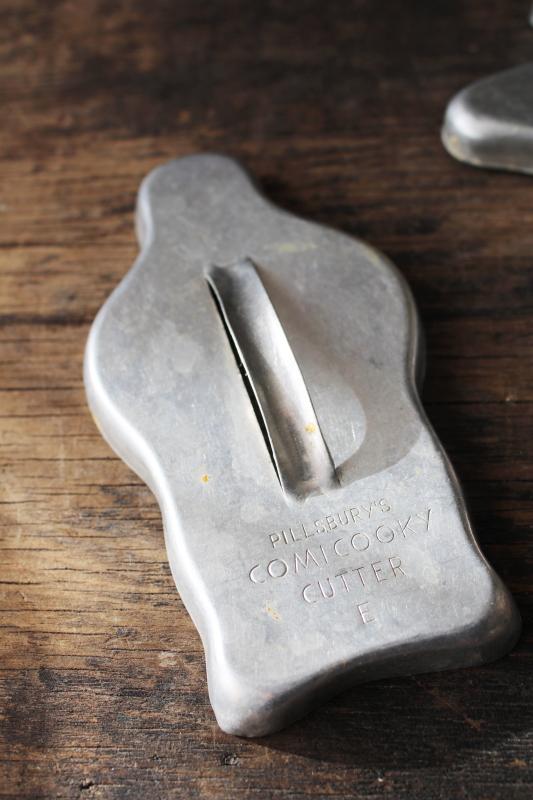 photo of vintage metal cookie cutters, gingerbread man & Pillsbury advertising dough boy #2