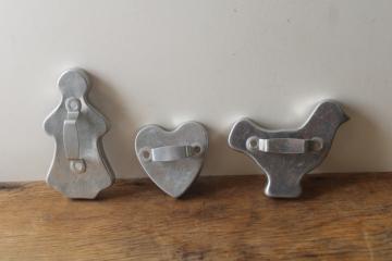 catalog photo of vintage metal cookie cutters, girl loves chickens gingerbread lady, heart, hen 