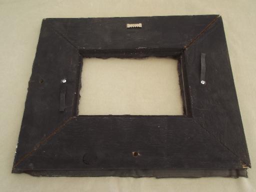 photo of vintage metal frame made of embossed tin ceiling with shabby old paint #3