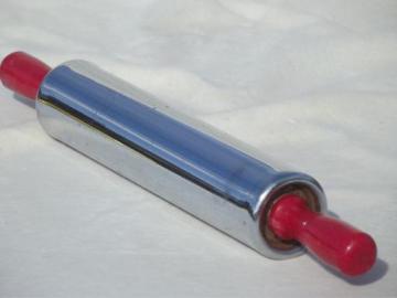 catalog photo of vintage metal rolling pin, Krispy Krust steel rolling pin w/ red handles