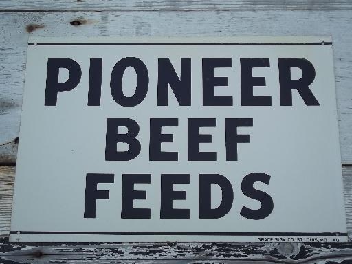 photo of vintage metal sign Pioneer Beef Feed, old farm feed mill advertising #1