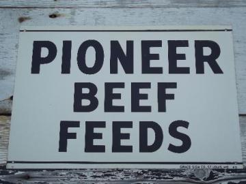 catalog photo of vintage metal sign Pioneer Beef Feed, old farm feed mill advertising