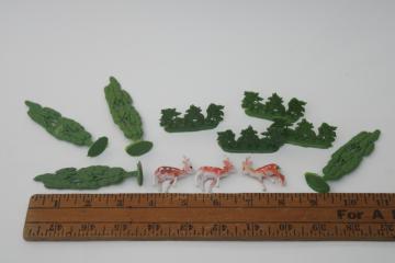 catalog photo of vintage miniatures lot, tiny plastic deer & greenery, trees & bushes, made in Hong Kong?