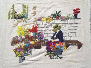 catalog photo of vintage needlework picture, flower peddler lady, embroidered wool on linen