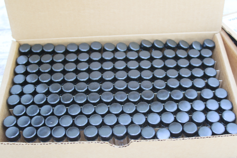 photo of vintage new old stock cases of one dram vials, tiny glass bottles w/ screw on lids  #5