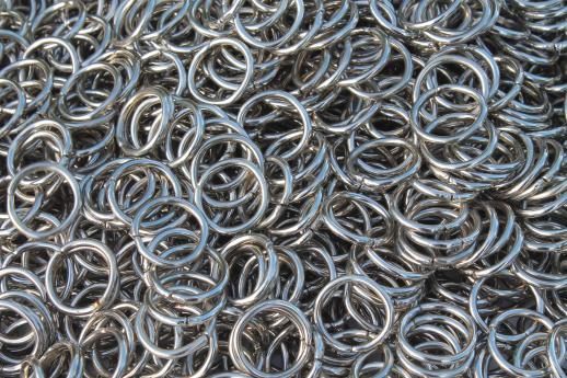 photo of vintage nickel plated steel o ring, 7.5 lb  metal o-rings 3/4'' dia new old stock lot of 1200+ #1