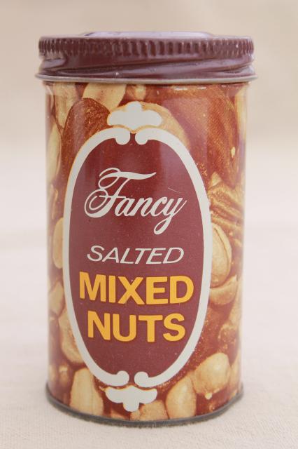 photo of vintage novelty joke toy, exploding snake in a can, can of nuts w/ pop out spring snake #1