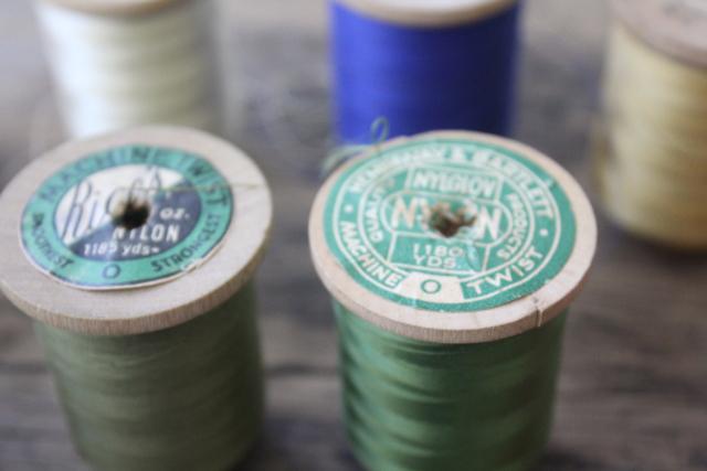 photo of vintage nylon sewing thread in jewel colors on big old wooden spools #6