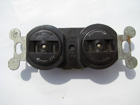 photo of vintage old architectural bakelite Bell Electric Co self-closing wall receptacles/sockets #3