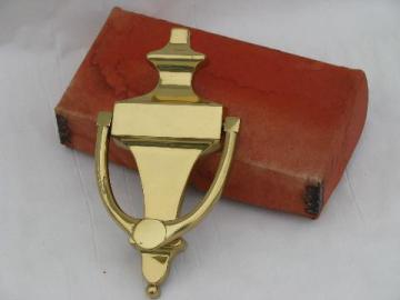 catalog photo of vintage old-new-stock architectural door knocker, solid brass