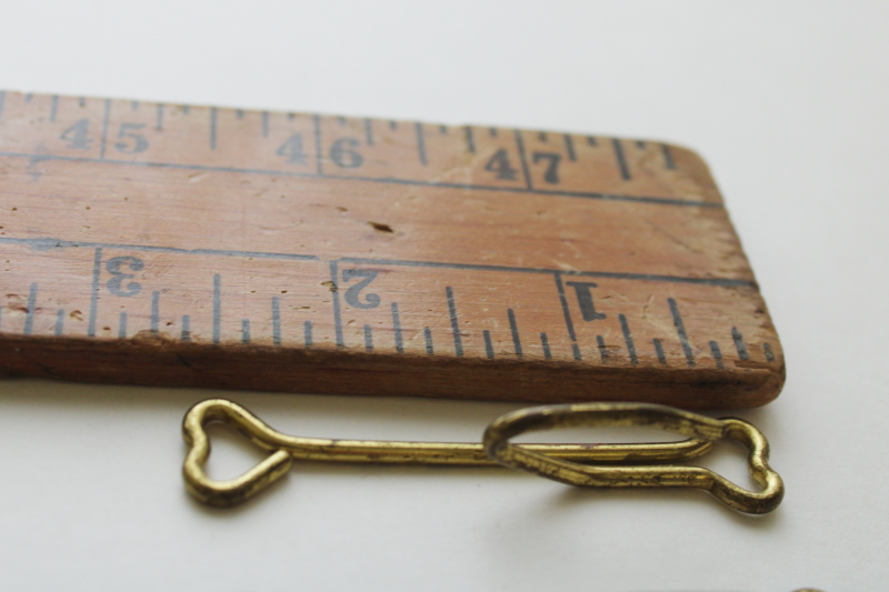 photo of vintage or antique curtain hanging drapery hooks w/ tiny hearts, gold tone wire pinch pleat hardware  #2